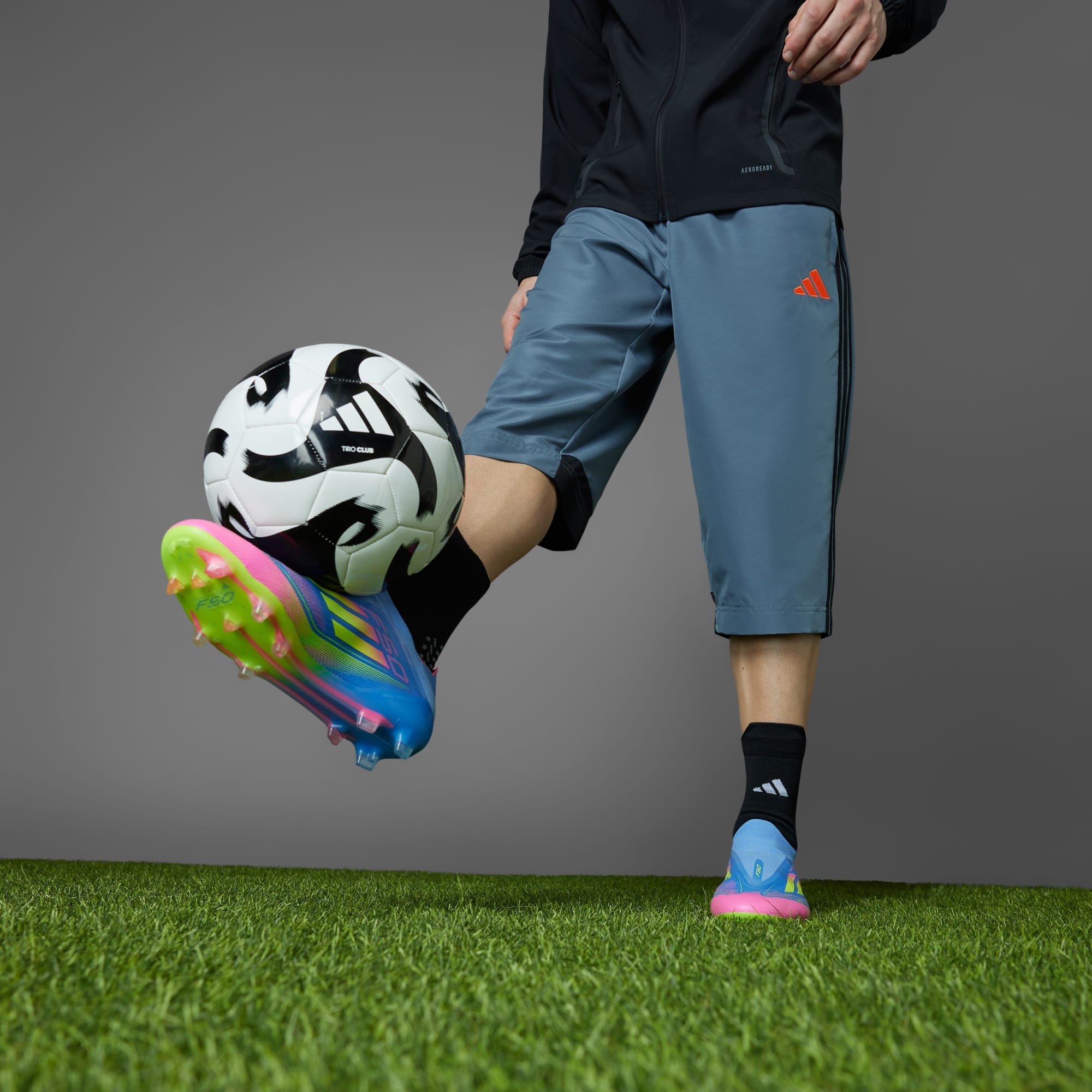 Botín de Fútbol F50 Elite Laceless FG Azul/Rosa